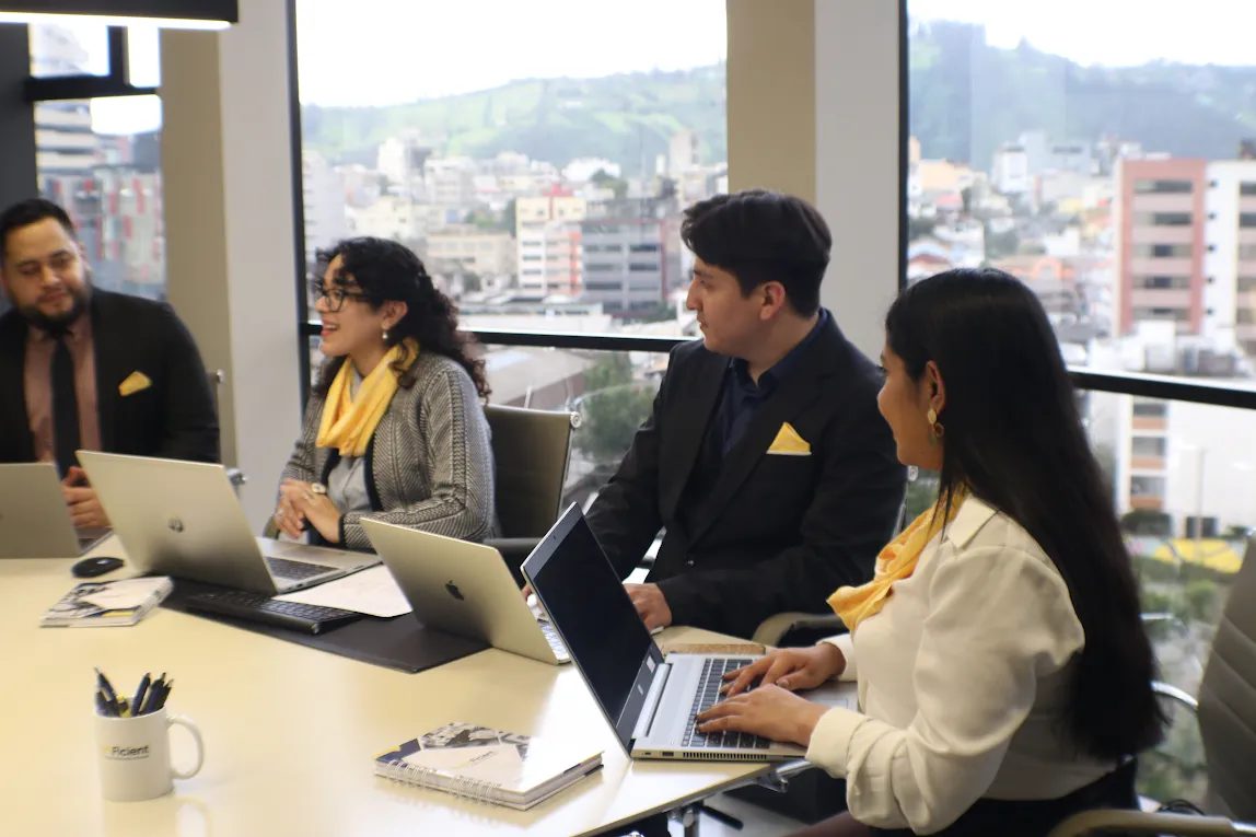 The TeamFicient team collaborating in a meeting